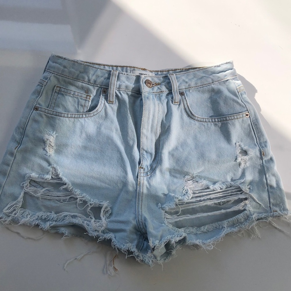 FOREVER 21 RIPPED LIGHT WASH HIGH WAISTED SHORTS